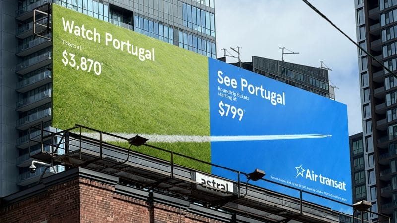 Image » new classic Pair of building billboards advertising Portugal travel: green 'Watch Portugal' from ,870 and blue 'See Portugal' from 9 by Air Transat, in an urban setting.