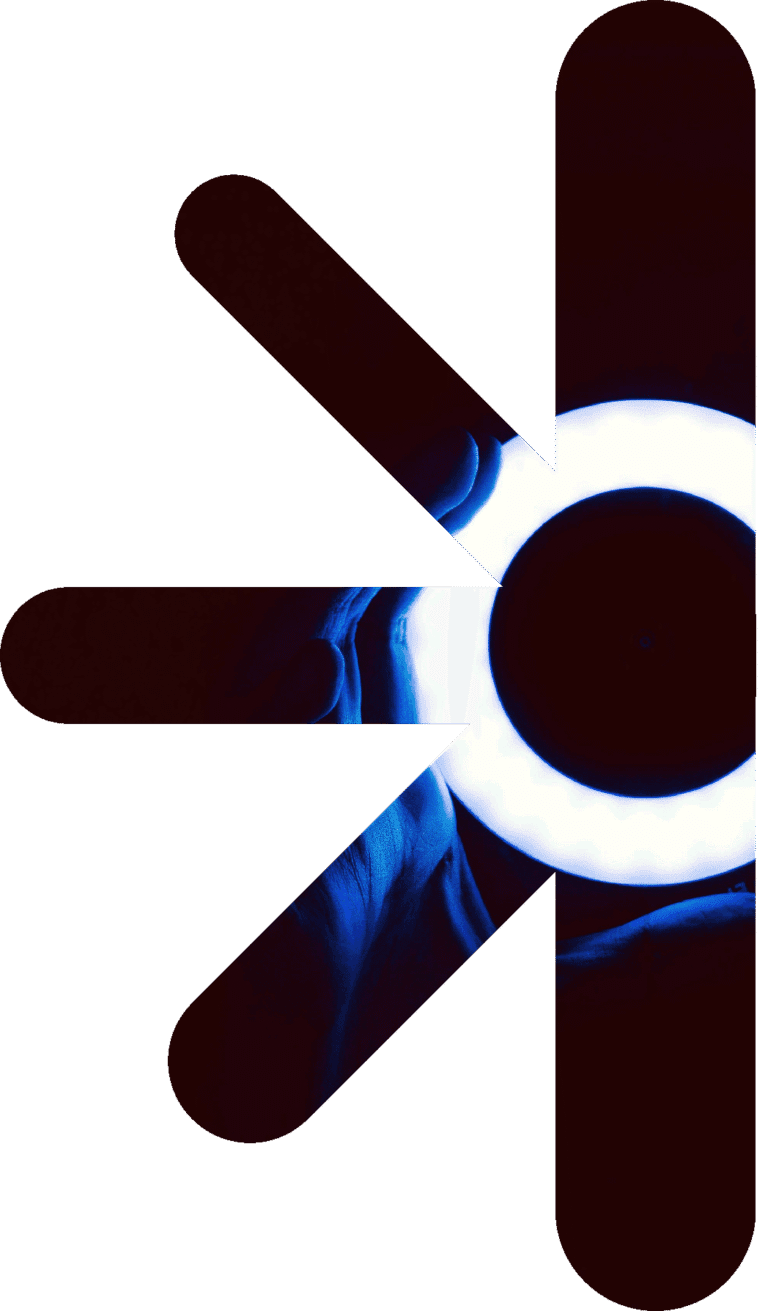 Abstract composition with dark rounded shapes over a blue glowing ring, forming a stylized pinwheel.