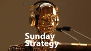 Golden robot wearing headphones speaks into microphones for a podcast titled Sunday Strategy